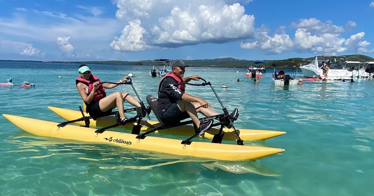 Water bike crossing turquoise shallows between the cays on a La Parguera cays water bike tour in Lajas, Puerto Rico