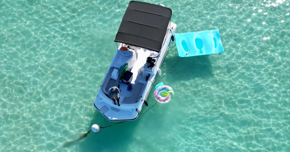 Private charter boat anchored at a sandbar cay on a La Parguera private boat tour in Puerto Rico